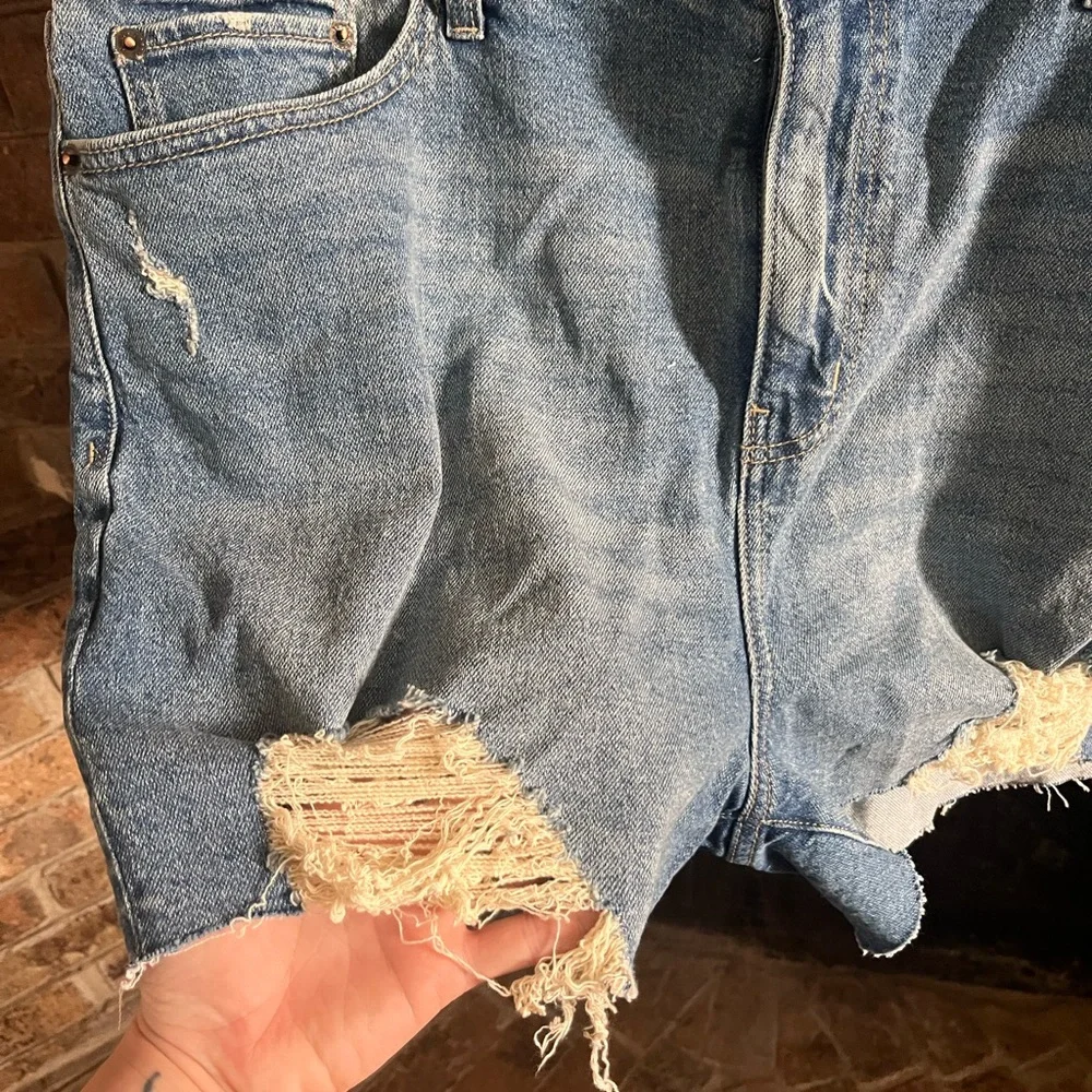 Torrid Light Blue Ripped Jean Shorts - Picture 5 of 5